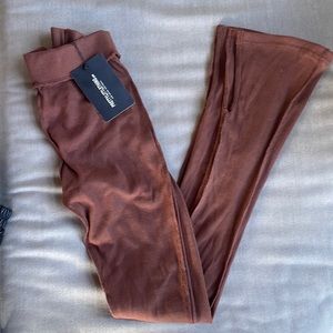 PLT Pretty Little Thing Branded Archive New Season Stretch Yoga pants Size us 4